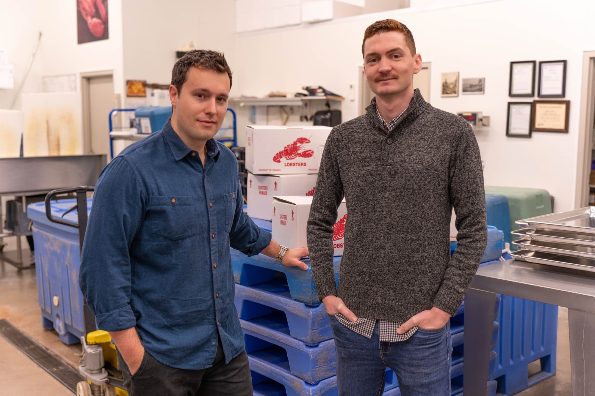 Tracktile co-founders Jordan Rose and Jarred Kenny on a seafood processing floor